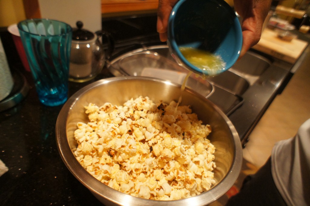 butter poured on popcorn